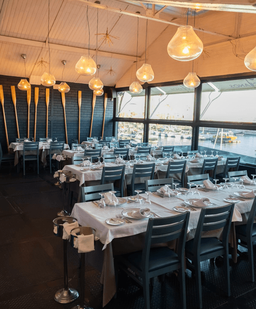 The dining room at 5 Oceanos facing the marina