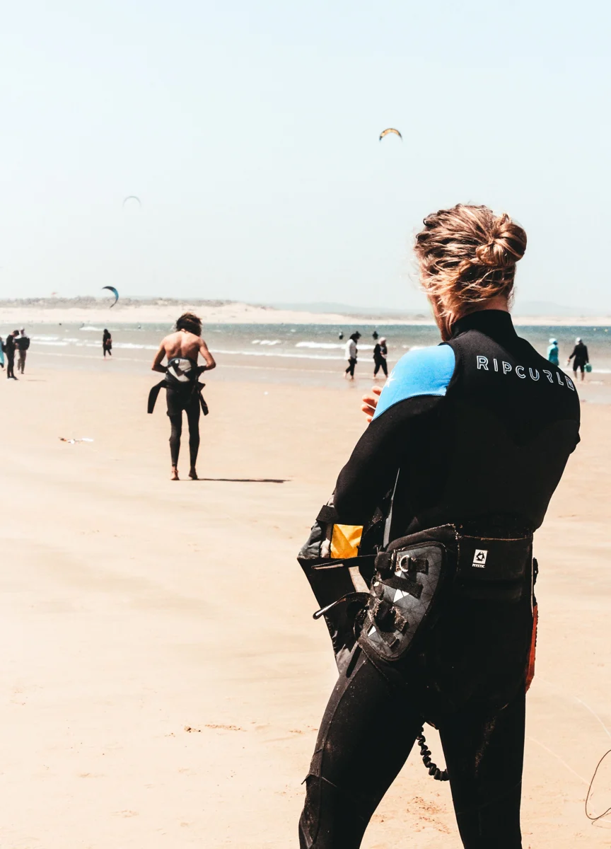Surfer facing the Atlantic Ocean near Lisbon