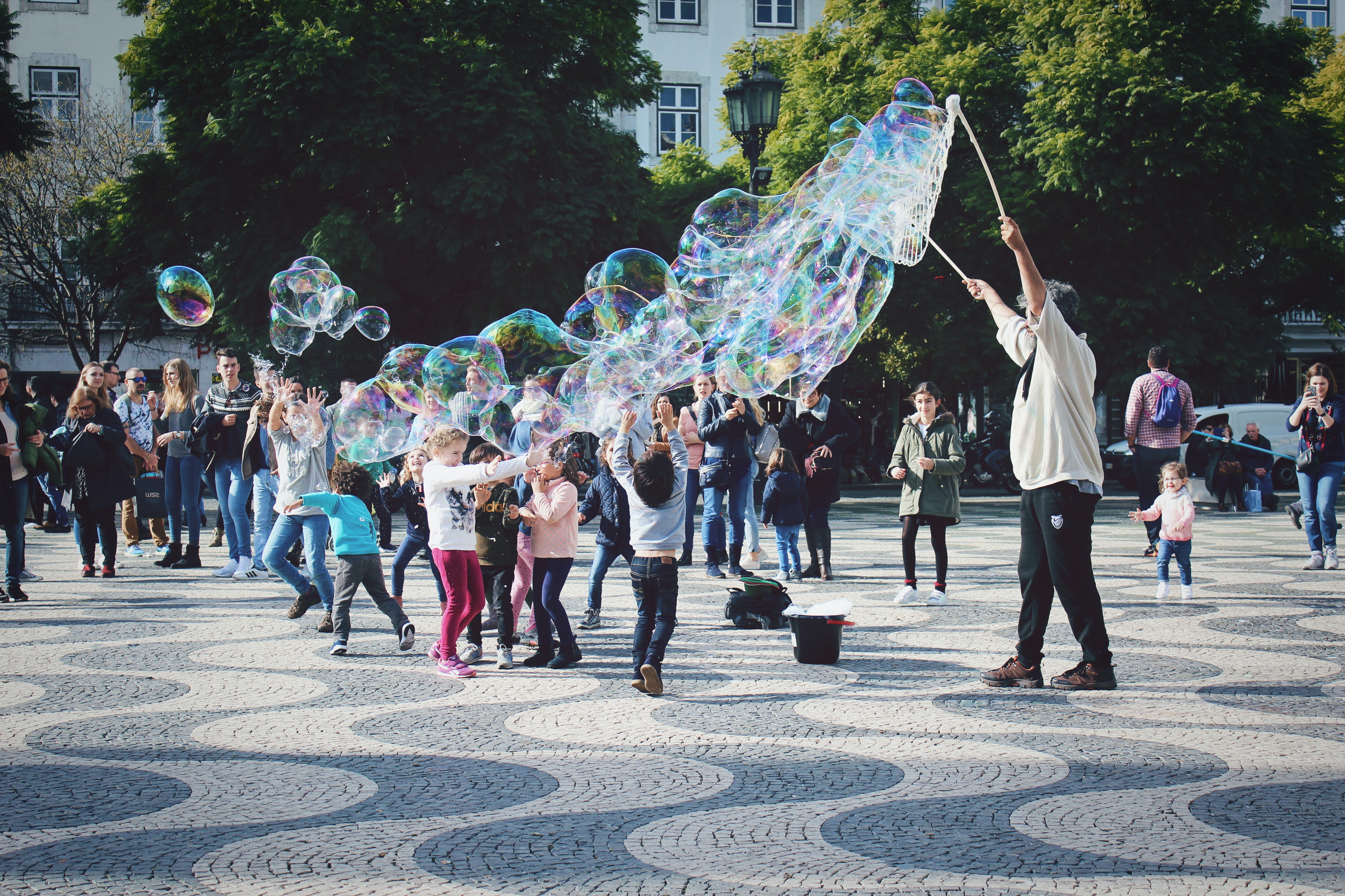 Families together on Rossio square in Lisbon